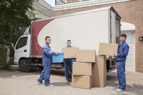 Removal team helping with a move in Bounds Green outside a residential property