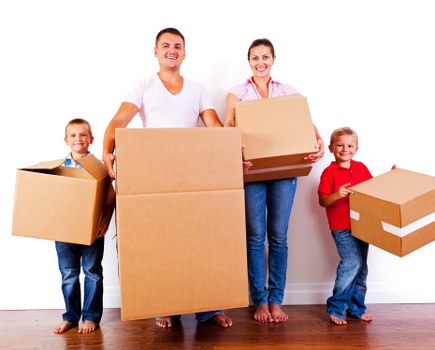Loading boxes and furniture into a van for a local move