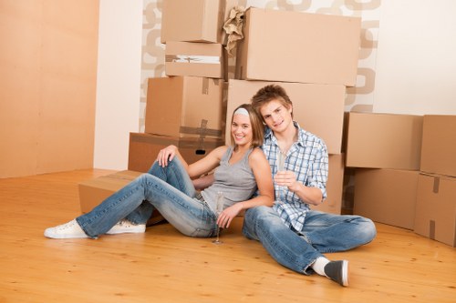 Local movers handling furniture and boxes in Bounds Green