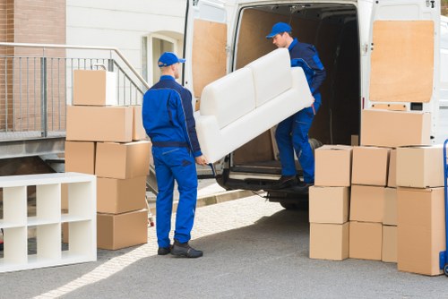 Local moving van handling furniture and boxes in Bounds Green