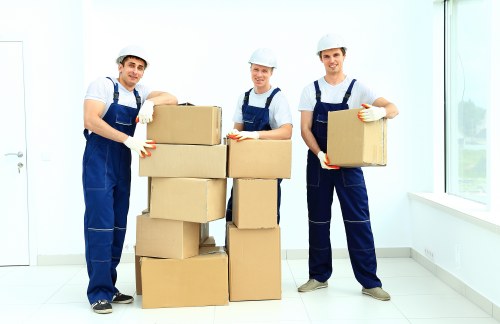 Packed moving boxes and furniture prepared for removals in Bounds Green