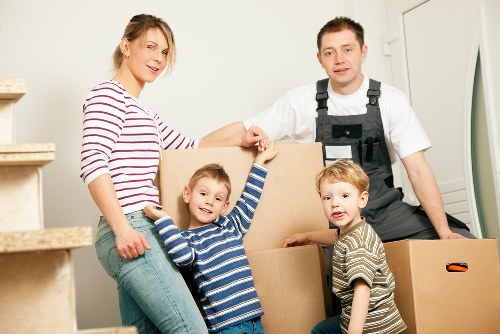 Packed office boxes and furniture ready for relocation