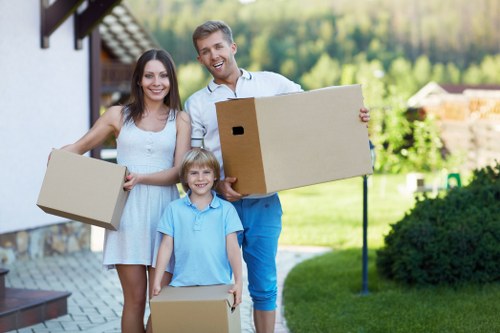 Moving team handling furniture in a Bounds Green flat or terrace