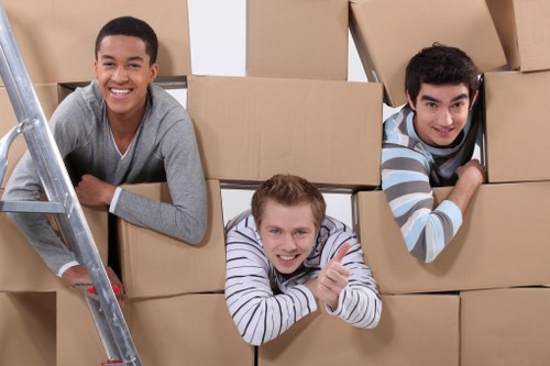 Packing and loading furniture into a removals van in North London