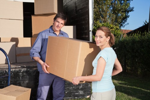 Loading furniture and boxes into a van for a Bounds Green relocation